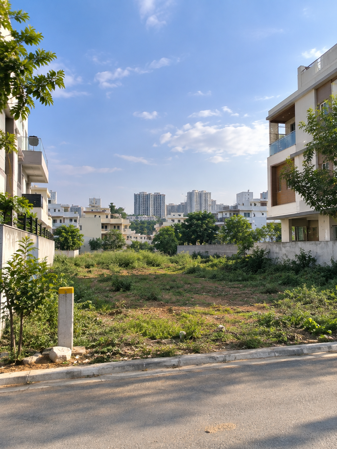 Open plot with boundary stones near Aziz Nagar, Moinabad mandal